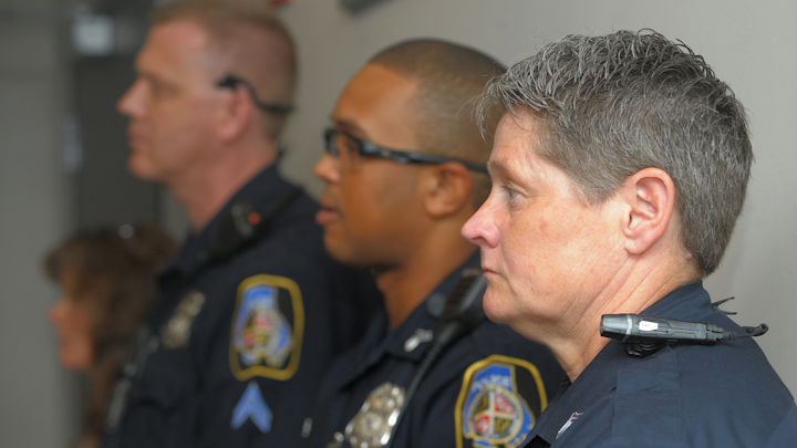 A Baltimore County police officer wears a body camera in this 2016 photo. County Executive Johnny Olszewski said Tuesday that the department should release body camera footage more quickly.