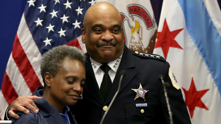Chicago police Superintendent Eddie Johnson stands with Mayor Lori Lightfoot at the announcement of his retirement during a press conference at police headquarters, Thursday, Nov, 7, 2019.