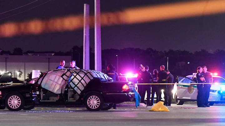 Police from Miramar Police Department and Miami-Dade Police Department work the scene at the intersection of Miramar Parkway and Flamingo Road Thursday, Dec. 5, 2019 after a jewelry store in Coral Gables was robbed, the suspects hijacked a UPS truck and its driver and led police on a chase all the way to Miramar. The chase came to an end with a shootout on a traffic packed stretch of Miramar Parkway.