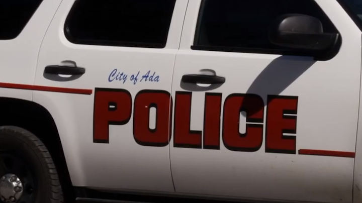 An Ada police officer was wounded an the suspected gunman was shot dead as police attempted to serve an arrest warrant at a residence Tuesday morning.