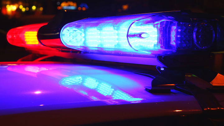 Police are looking for two males who dragged two Dayton police officers who tried to remove the suspects from a stolen vehicle just minutes after the same suspects tried to run over two other officers.