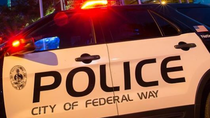 Two Federal Way police officers were injured and a 23-year-old man died early Tuesday in a gunfight between the man and officers, who were responding to a disturbance call.