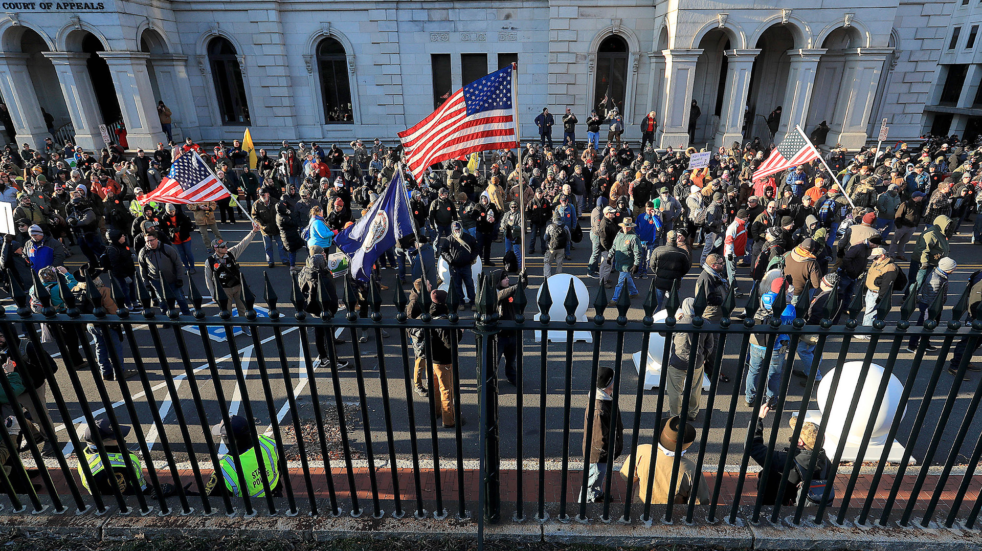 Gun rights supporters gather on Bank Street near Capitol Square for a rally expected to draw hundreds of thousands of people concerned that their Second Amendment rights are under threat on Monday, Jan. 20, 2020.
