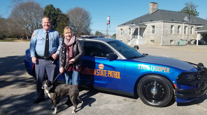 A Georgia State Patrol Trooper reunited a lost dog with its owner over the weekend following a crash on Friday.