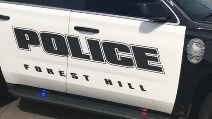 A Forest Hill police officer was injured in a shooting and a suspect was dead after leading officers on a chase into Fort Worth in a stolen police vehicle Wednesday morning, police said.