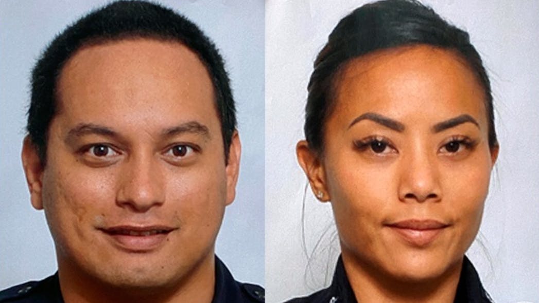 Officer Kaulike Kalama, left, and Officer Tiffany Enriquez