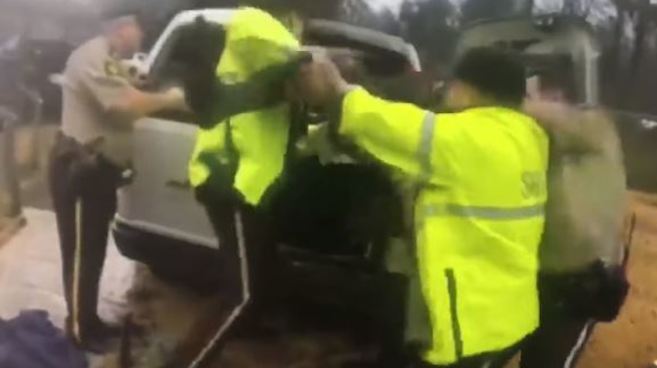 Newly released body camera video shows Brookside police arrest a 51-year-old California man who has been charged in the abduction and assault of a woman over the weekend.