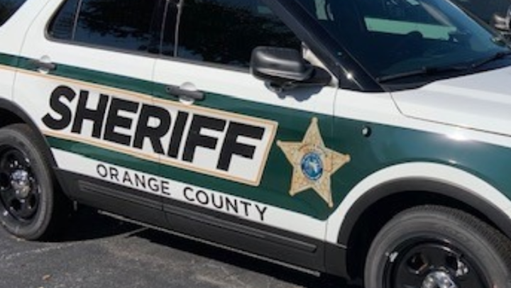 An Orange County Sheriff's deputy shot a man who had fired a gun toward him during a struggle in a shopping plaza Sunday night.