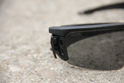 Look closely at the left edge of the lens. You can see two holes to set your lenses in. The frame has one guiding point on the bottom, the Lens Gate has the other - securely holding the frame in place. Look closely at the left edge of the lens. You can see two holes to set your lenses in. The frame has one guiding point on the bottom, the Lens Gate has the other - securely holding the frame in place.