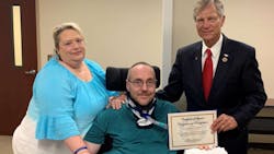 From left to right: Kami Whitten (wife), Deputy Richard Whitten, and Rep. Brian Babin. From left to right: Kami Whitten (wife), Deputy Richard Whitten, and Rep. Brian Babin.
