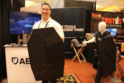 Aegix Global partnered with Advanced Technology Compliant Solutions, (ATCS) to design a foldable, ballistic shield: the Swift Shield. The idea is that an officer doesn’t have to make room for large, bulky riot-type shields. Instead, an officer can simply fold it up “origami style” and easily engage it when needed. Bryan Segal, R-BIC and Swift Shield specialist for AEGIX displays the prototype of the unique ballistic shield. Aegix Global partnered with Advanced Technology Compliant Solutions, (ATCS) to design a foldable, ballistic shield: the Swift Shield. The idea is that an officer doesn’t have to make room for large, bulky riot-type shields. Instead, an officer can simply fold it up “origami style” and easily engage it when needed. Bryan Segal, R-BIC and Swift Shield specialist for AEGIX displays the prototype of the unique ballistic shield.