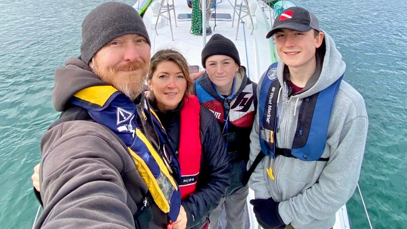 Homeland Security Investigations (HSI) Special Agent Steven M., his wife Bobbi M., sons Hunter M., 17, and Chance M., 13, pose for a family photo, March 23, before taking off on a family boating trip to the Strait of Juan de Fuca, where they later saved a man in danger of drowning.