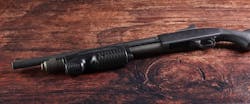 The Mossberg 590 with the Streamlight TL-Racker mounted.