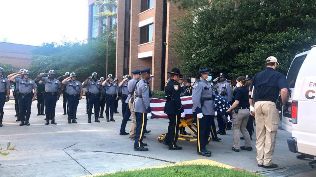 A veteran Baton Rouge police officer died Sunday after he and his colleague were shot while responding to tips about a homicide suspect in the city's Howell Park neighborhood.