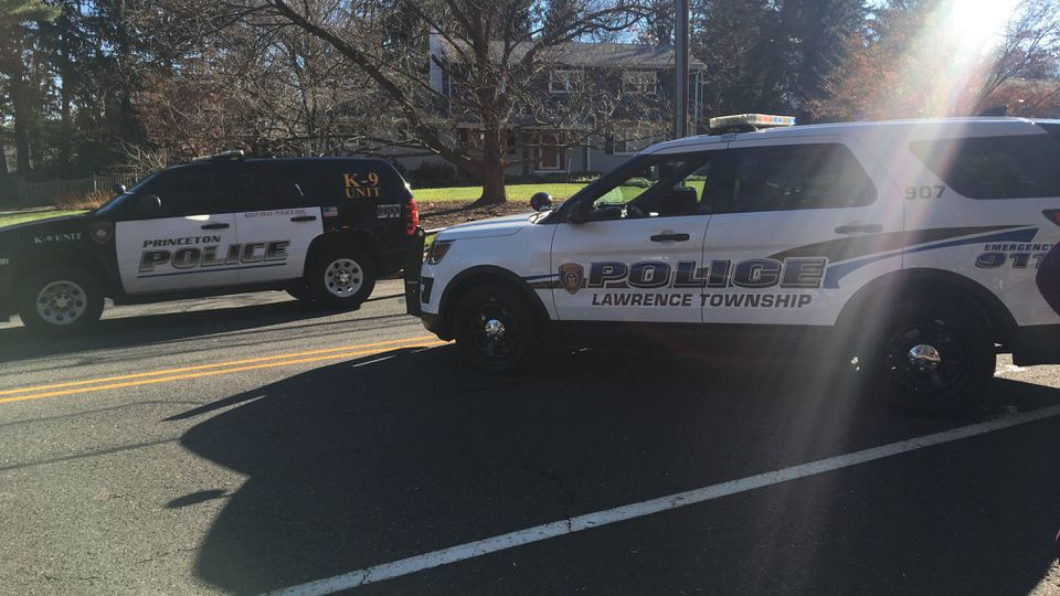 Police cars parked outside Ben Franklin Elementary School in Lawrence Township, Mercer County on Friday.