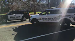 Police cars parked outside Ben Franklin Elementary School in Lawrence Township, Mercer County on Friday.