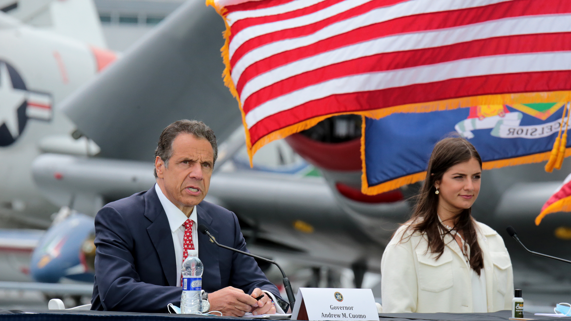 New York Governor Andrew Cuomo and his daughter Michaela Kennedy Cuomo are seen during the Governor's daily press briefing from the Intrepid Sea Air Museum on Memorial Day during the coronavirus pandemic outbreak.