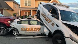 A Bibb County Sheriff&rsquo;s deputy was injured after a suspect plowed into three patrol vehicles, causing one to end up on top of another Tuesday night.