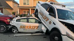 A Bibb County Sheriff’s deputy was injured after a suspect plowed into three patrol vehicles, causing one to end up on top of another Tuesday night.