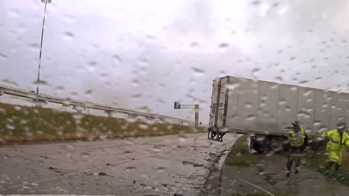 A Belton police officer and two Texas Highway Patrol troopers had a close call on Tuesday when tractor-trailer lost control and almost hit them.