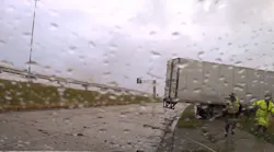 A Belton police officer and two Texas Highway Patrol troopers had a close call on Tuesday when tractor-trailer lost control and almost hit them.
