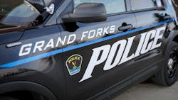 A Grand Forks police officer was shot and killed and a Grand Forks County Sheriff&apos;s deputy was wounded while attempting to serve eviction papers Wednesday afternoon.