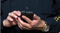 Officer using FirstNet on smartphone device