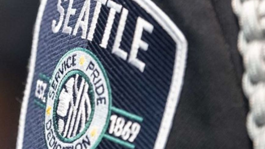 A video shared on social media over the weekend shows a Seattle police officer stop his colleague from using his knee to pin a protester by the neck during protests over the death of a black man in the custody of Minneapolis police officers last week.