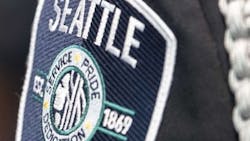 A video shared on social media over the weekend shows a Seattle police officer stop his colleague from using his knee to pin a protester by the neck during protests over the death of a black man in the custody of Minneapolis police officers last week. A video shared on social media over the weekend shows a Seattle police officer stop his colleague from using his knee to pin a protester by the neck during protests over the death of a black man in the custody of Minneapolis police officers last week.