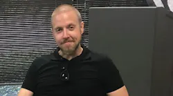 San Marcos Police Officer Justin Mueller returned to the job this week only eight weeks after sustaining serious gunshot wounds in an ambush that took a colleague's life.