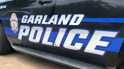 A Dallas man was arrested during a manhunt Sunday after police say he was caught on video running over and dragging a Garland police officer with a car.
