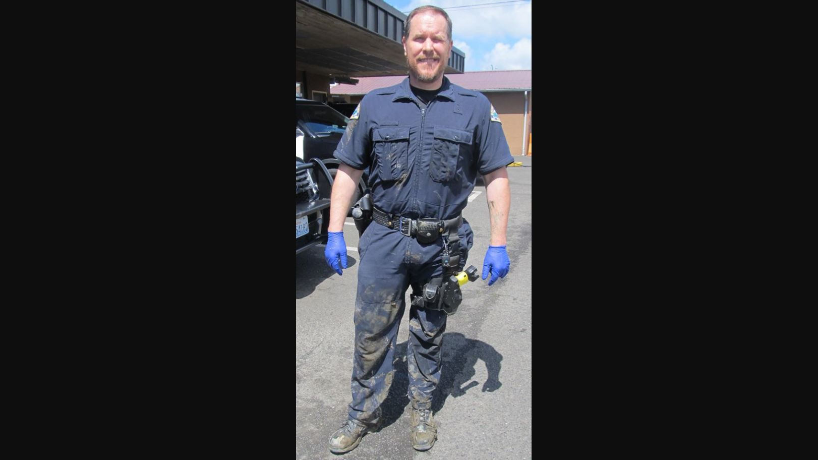 An Aberdeen police officer rescued a woman stranded in a river over the weekend.