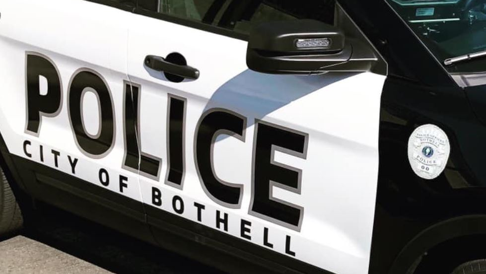 One Bothell police officer was killed and another was injured in a shooting in the city's downtown Monday night after a traffic stop turned into a brief vehicle pursuit.
