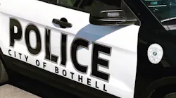 One Bothell police officer was killed and another was injured in a shooting in the city's downtown Monday night after a traffic stop turned into a brief vehicle pursuit.