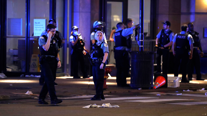 At Least 13 Chicago Police Officers Injured 2 People Shot More Than 100 Arrests After Riots And Looting Downtown Officer