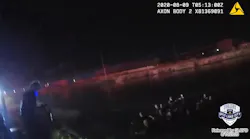 Newly released video shows Salt Lake City police officers and firefighters help save children from a submerged vehicle Saturday night.