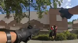 Body camera footage released on Friday shows Salt Lake City police officers fatally shoot a suspect holding a knife to another man's neck in late July.
