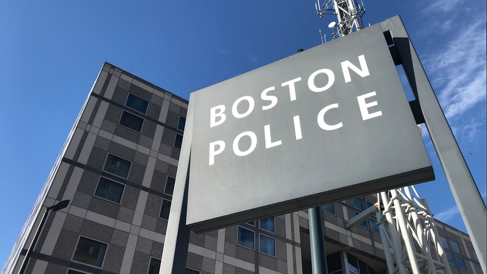 Nine current and former Boston police officers were arrested and charged by federal prosecutors Wednesday for allegedly engaging in a yearslong scheme to defraud the department of overtime pay.