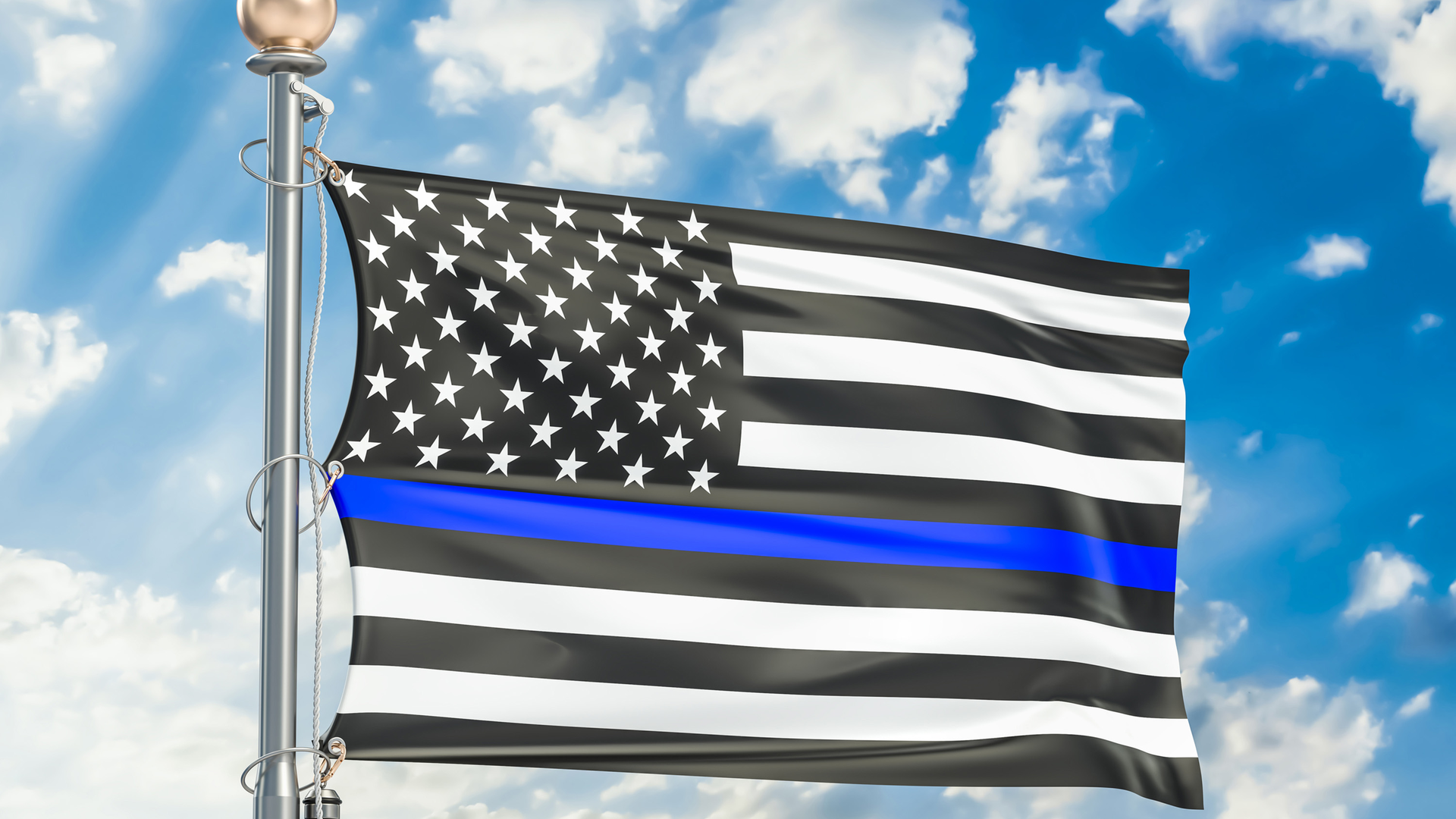 Two Warren County officials have joined those criticizing the suspension of two Little Miami football players who took the field Friday night with flags supporting the Blue Lives Matter movement, after being told not to by school officials.
