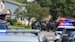 Washtenaw County Sheriff's deouties, Michigan State Police, ATF agents and members of the U.S. Marshal Service Fugitive Task force secure the scene off Prospect Road and Berkshire Drive after a shooting on Wednesday, Sept. 16, 2020.