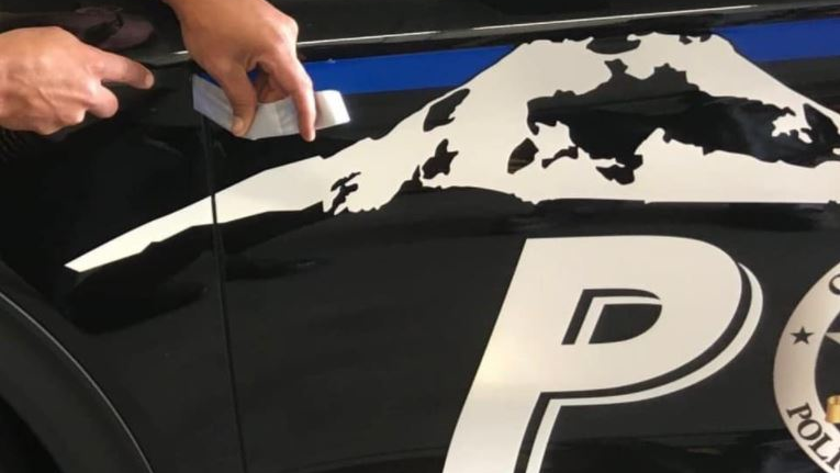 In a Facebook post Thursday, officials said that the decision comes after the 'divisive use of the thin blue line symbol to fit a narrative unassociated with our department or what we stand for.'