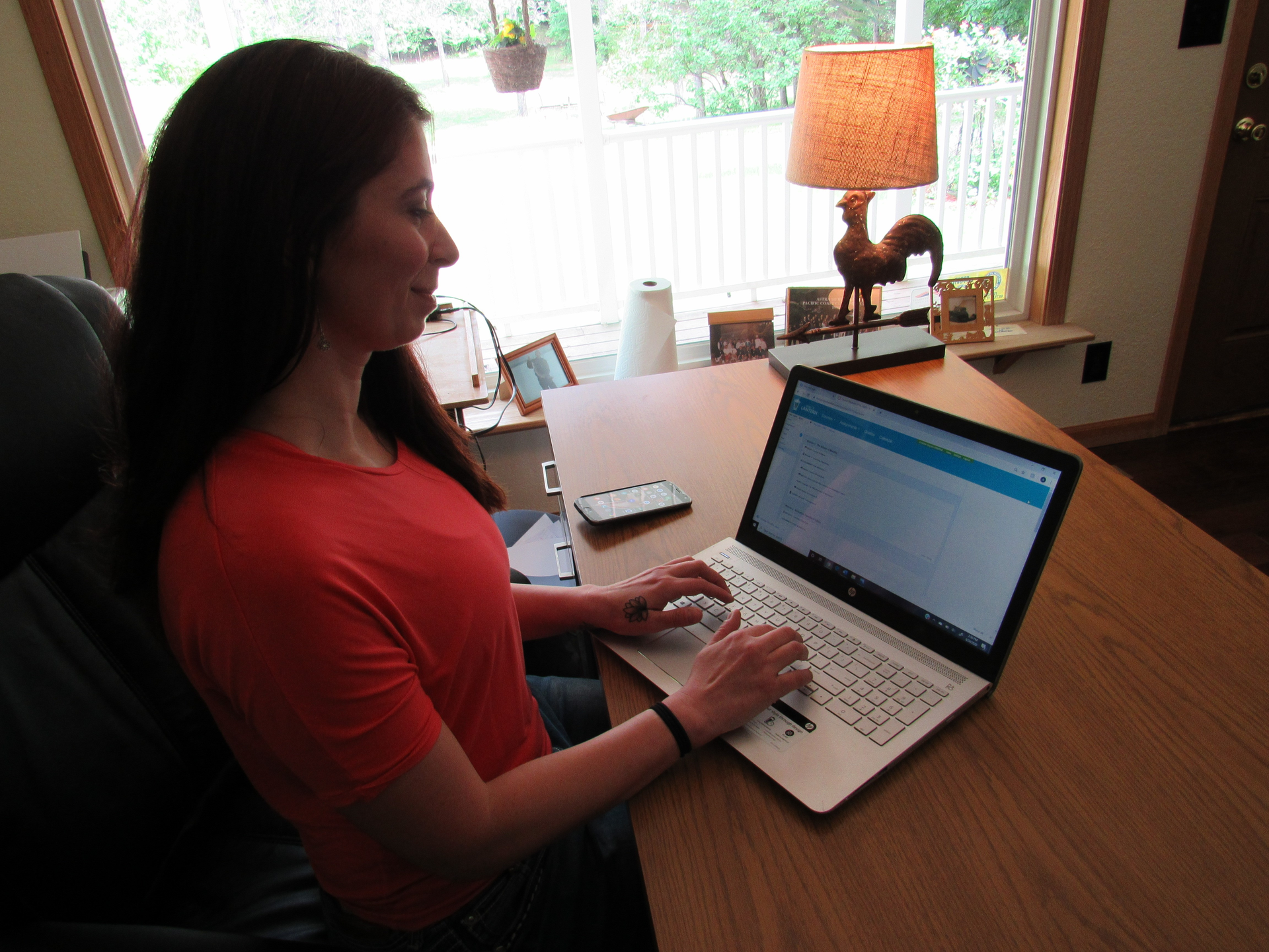 Utilizing the Securus Lantern digital educational program, former incarcerated individual, Amy Grayon works on her bachelor's degree.