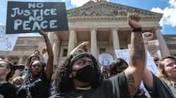 Hundreds of protesters gather during a rally Thursday, June 25, 2020 demanding justice for Breonna Taylor outside the Kentucky state Capitol in Frankfort, Kentucky.