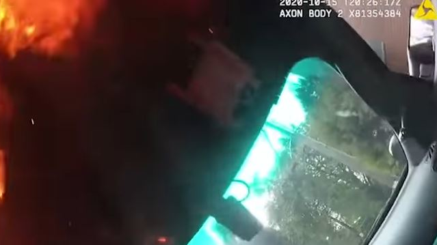 A 37-year-old Seattle man has been charged with two counts of assault after allegedly swinging at another man with a hammer, then setting an occupied police vehicle on fire in South Lake Union on Thursday.