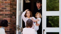 Parents leave Hubbard Woods Elementary School with their children after Laurie Dann shot six children, killing one, in the school on May 20, 1988, in Winnetka, Ill. Parents leave Hubbard Woods Elementary School with their children after Laurie Dann shot six children, killing one, in the school on May 20, 1988, in Winnetka, Ill.