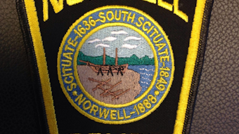 Officer saves three children and dog from fire.