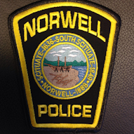 Officer saves three children and dog from fire.