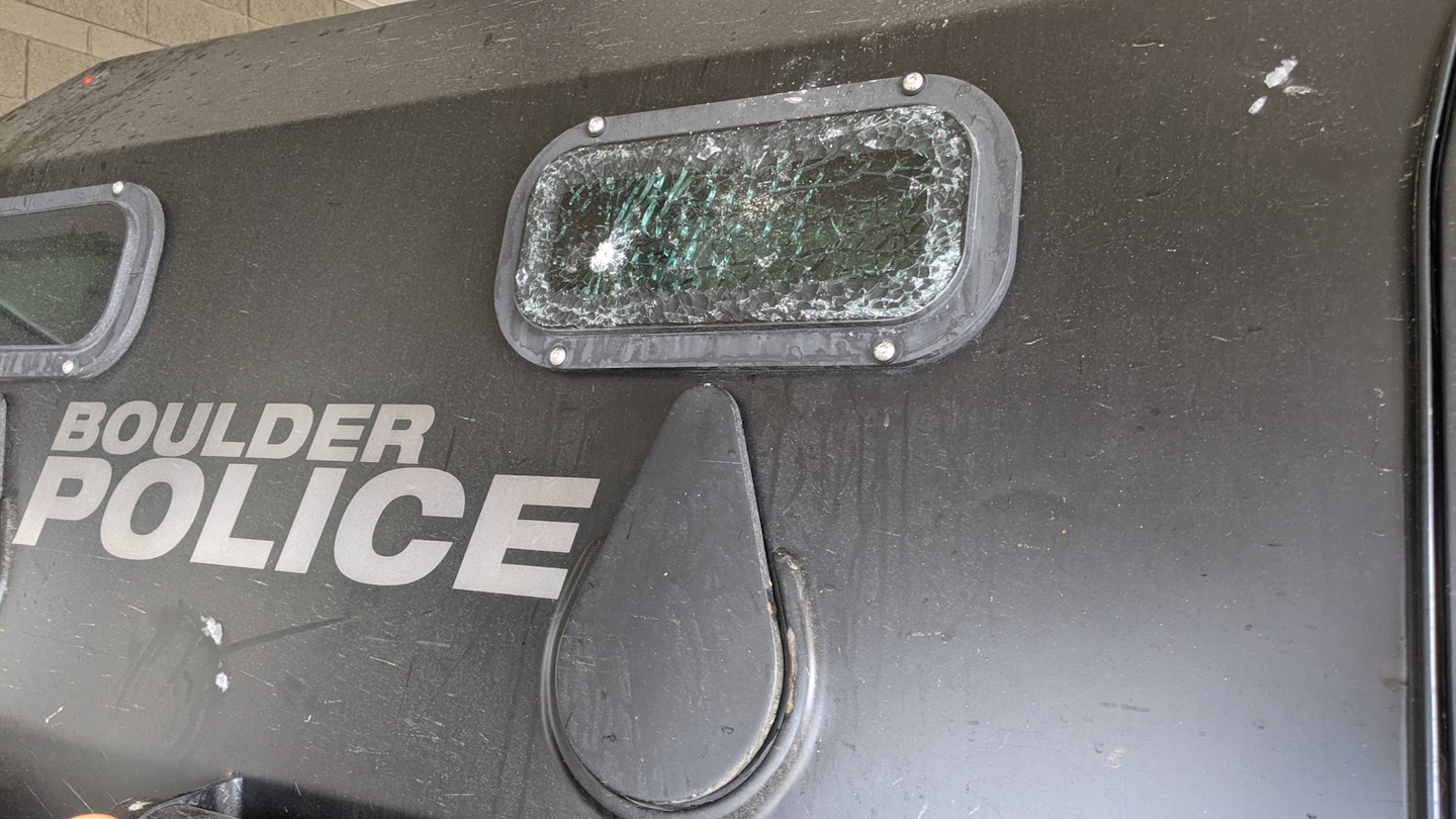 Three police officers were minorly injured, while many other cars plus a police vehicle and a Boulder Fire-Rescue engine were damaged.