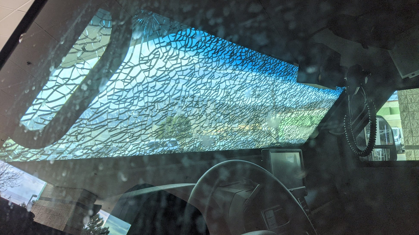 Three police officers were minorly injured, while many other cars plus a police vehicle and a Boulder Fire-Rescue engine were damaged.