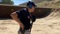 One important skill that Officers need to master is the ability to transition from long gun to handgun. The advantage of having a pump gun is the ability to rack the chamber open, and go to the handgun quickly. Whether using a 2-point or 1-point sling, the Officer simply clears the path for a smooth draw.